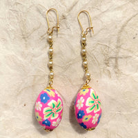 Lenora Dame Easter Egg Earrings. Cute earrings for spring. Floral egg shaped fimo beads, pearl chain dangle from French ear hooks.