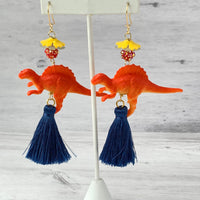 Lenora Dame Tangerine Spinosaurus Tassel Earrings