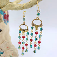 Red and green beaded chandelier earrings. Dangle Christmas earrings with red and green bead fringe.