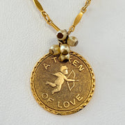 Gold Token of Love charm necklace. Cupid pendant necklace. Valentines gift for her.
