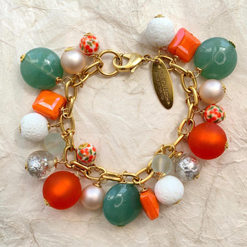 Green and orange beaded bracelet for women. Chunky charm bracelet. Lenora Dame jewelry.