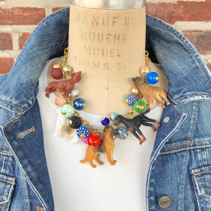 Dog charm jewelry for dog lovers. Colorful beads, dog figurine charms on a gold chain. Lenora Dame necklace. Dog necklace for humans. 