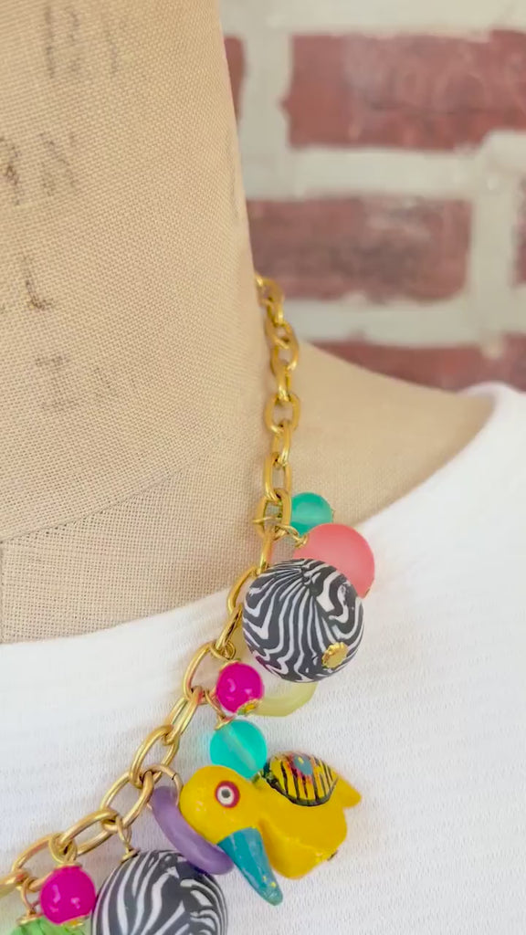 Lenora Dame Wooden Safari Animal Charm Necklace