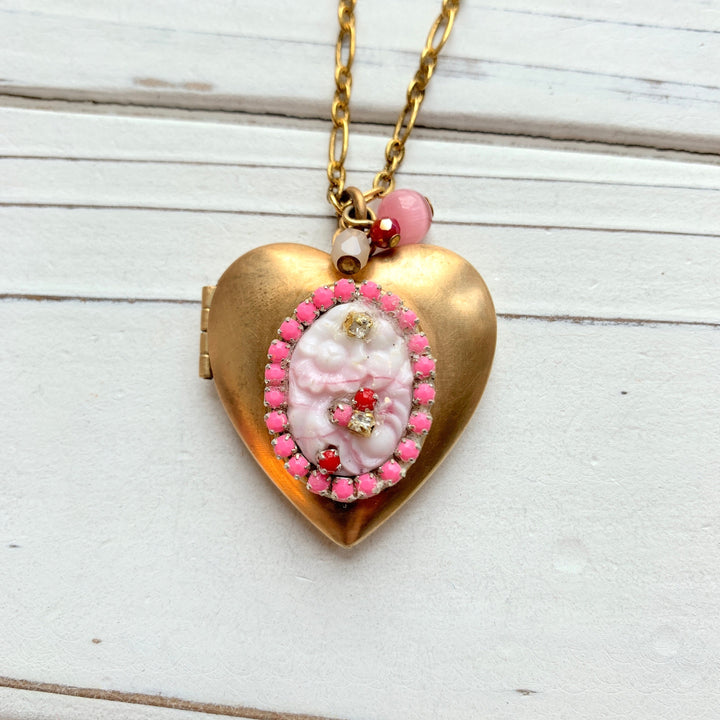 Gold heart locket necklace. Valentine's gift ideas for her.