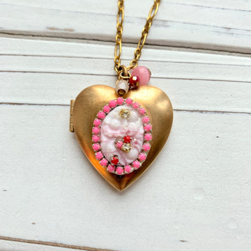 Gold heart locket necklace. Valentine's gift ideas for her.
